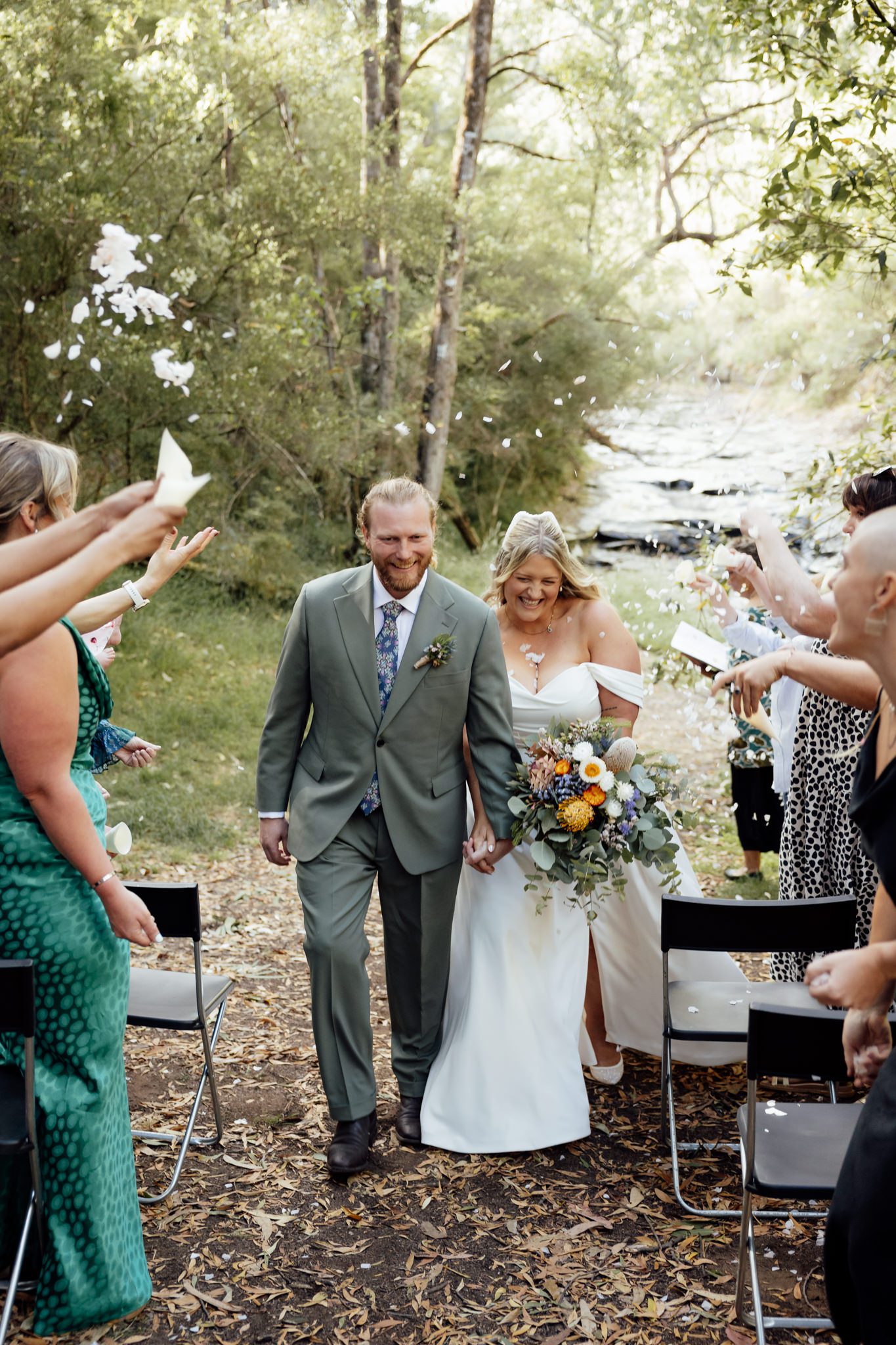 Micro wedding ceremony at Stony Creek waterfall, Lorne
